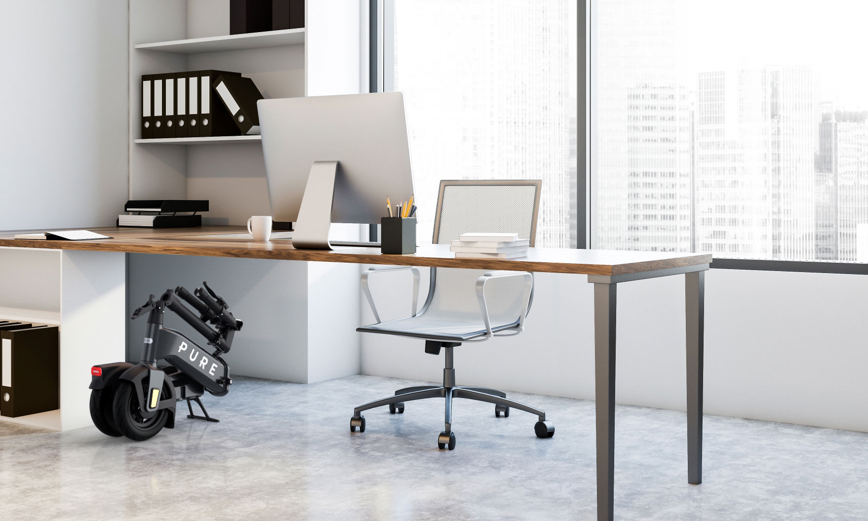 Image of the Pure Electric Advance Flex folded down under an office desk.