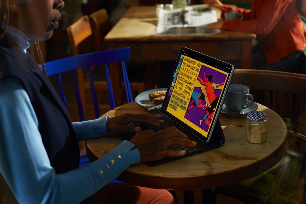 A person uses an iPad Pro while sitting at a table." data-uuid="d3bb5c8b-6571-395c-a6d2-872766e2a4c9