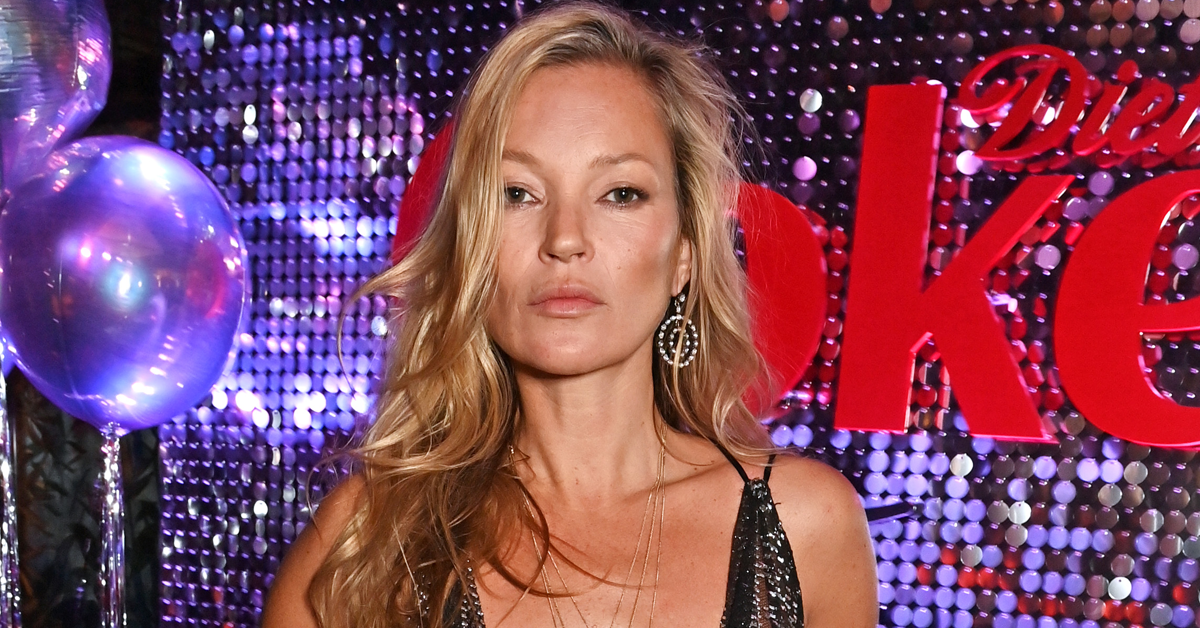 Braless Kate Moss has massive wardrobe malfunction in very low cut