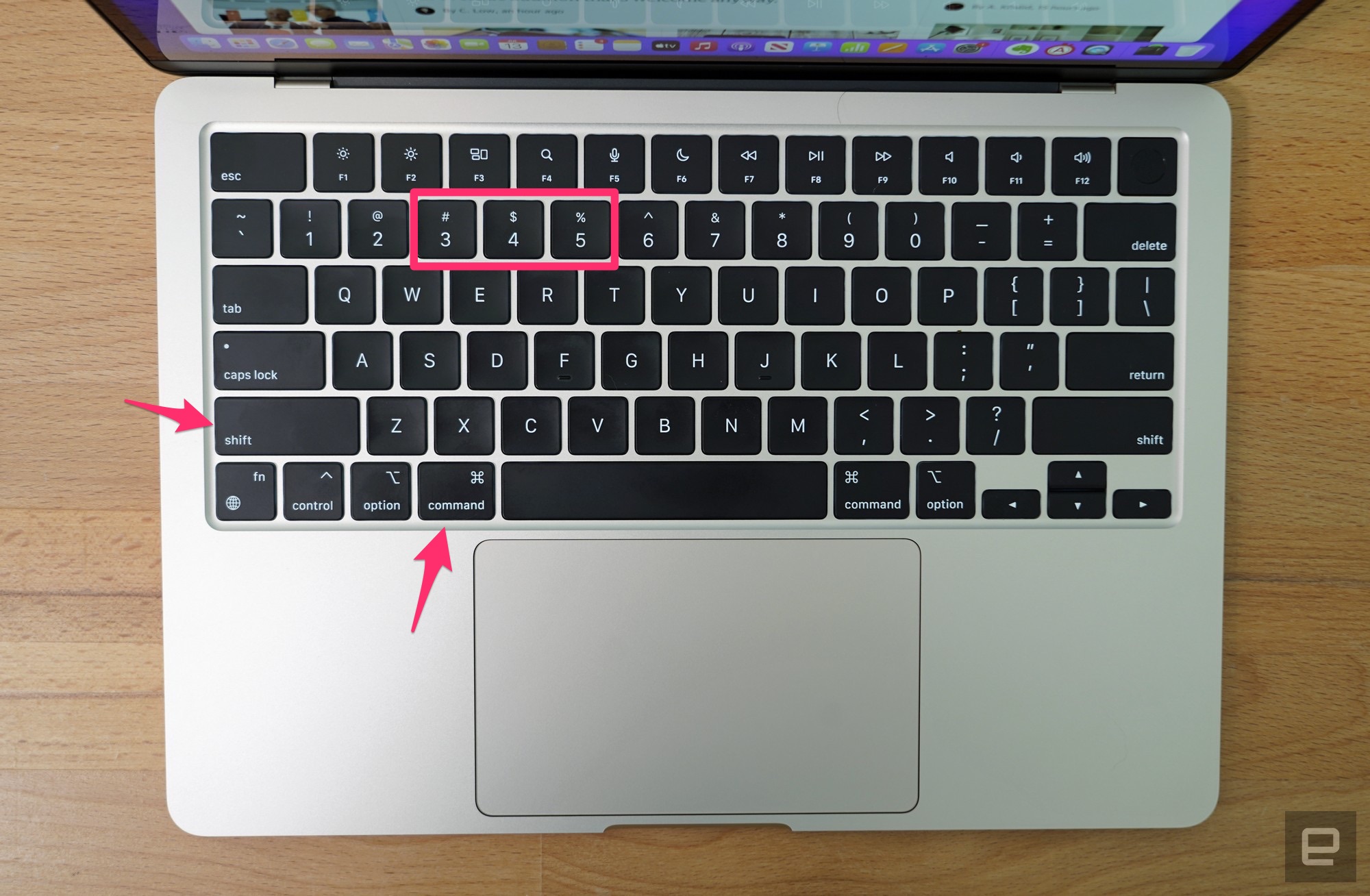 A screenshot of a MacBook Air's keyboard, with the keys for utilizing macOS' screenshot tools highlighted." data-uuid="71f0efbd-0ed1-3a32-8dd2-889281072e50