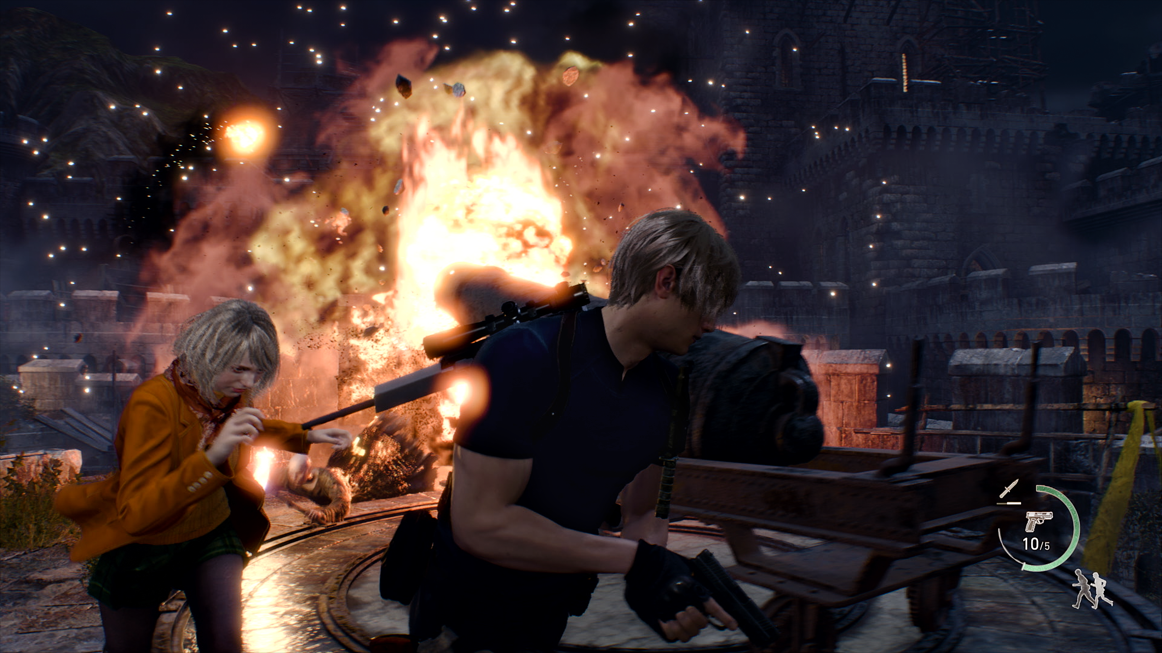 Ashley and Leon flee an explosion on the turret of a castle in Resident Evil 4." data-uuid="1cc196bd-d515-3275-84f1-97dc2d721fe1