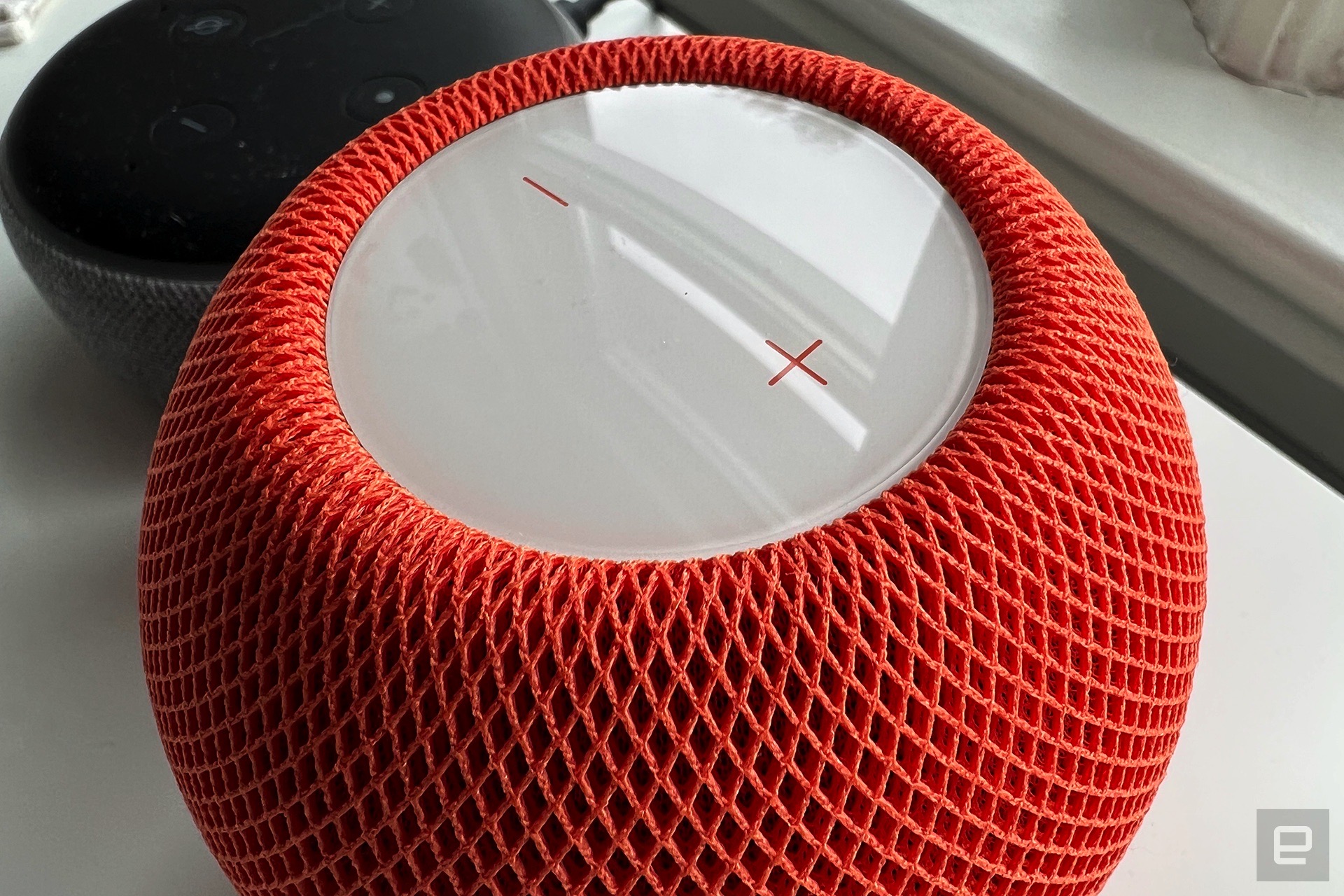 Apple HomePod mini in orange