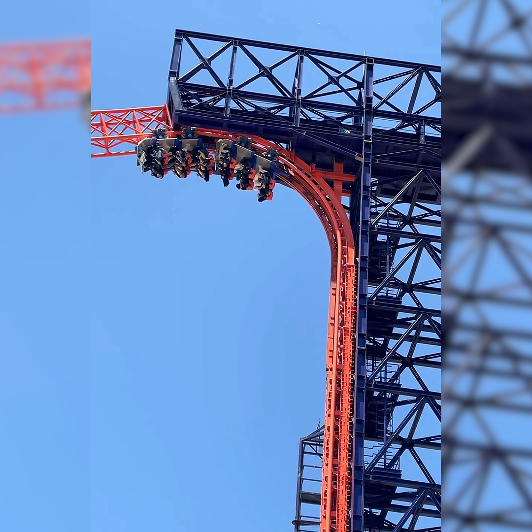 Riders upside down on roller coaster