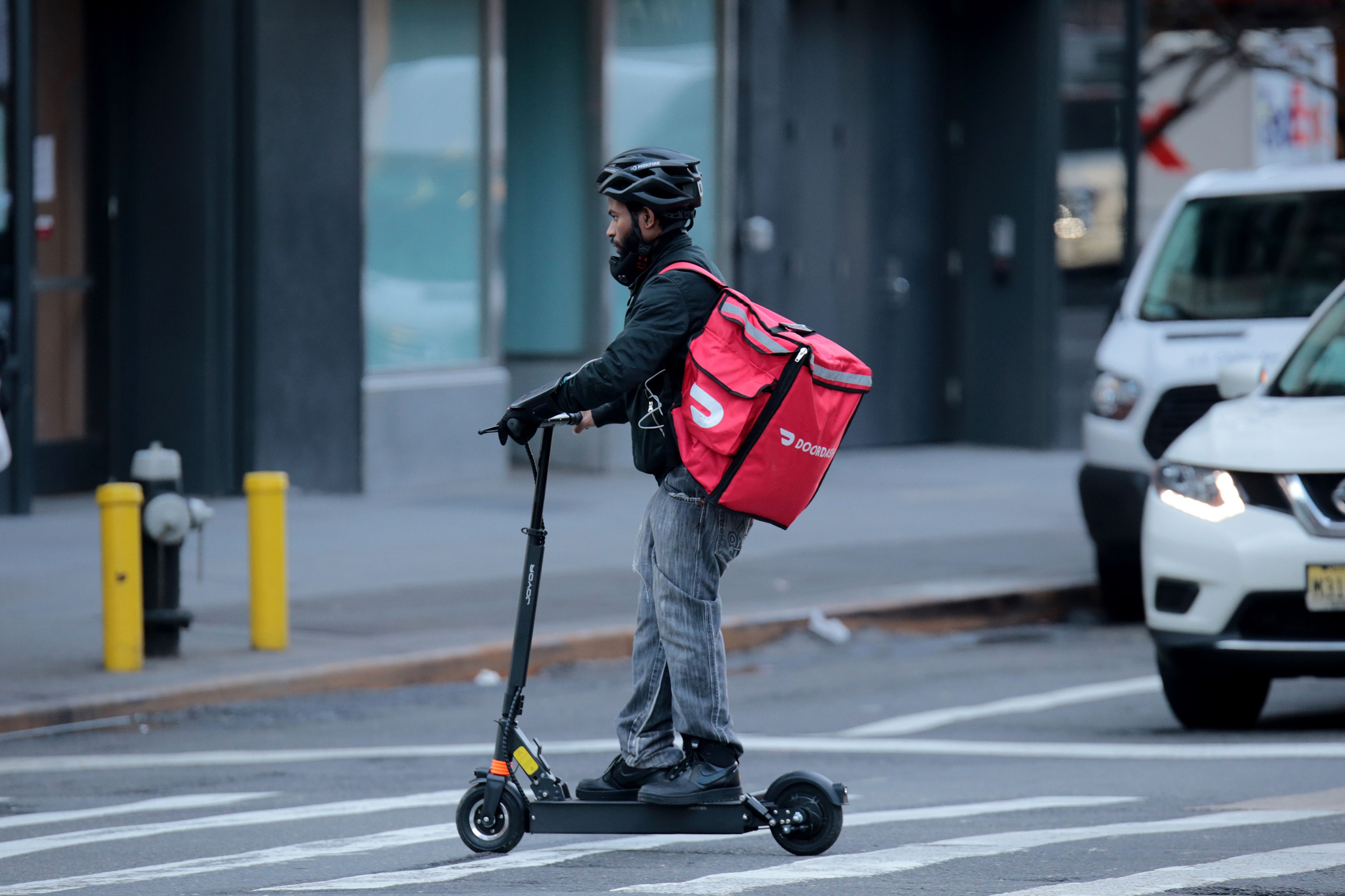 Uber, DoorDash and Grubhub sue New York City over $18 minimum-wage law