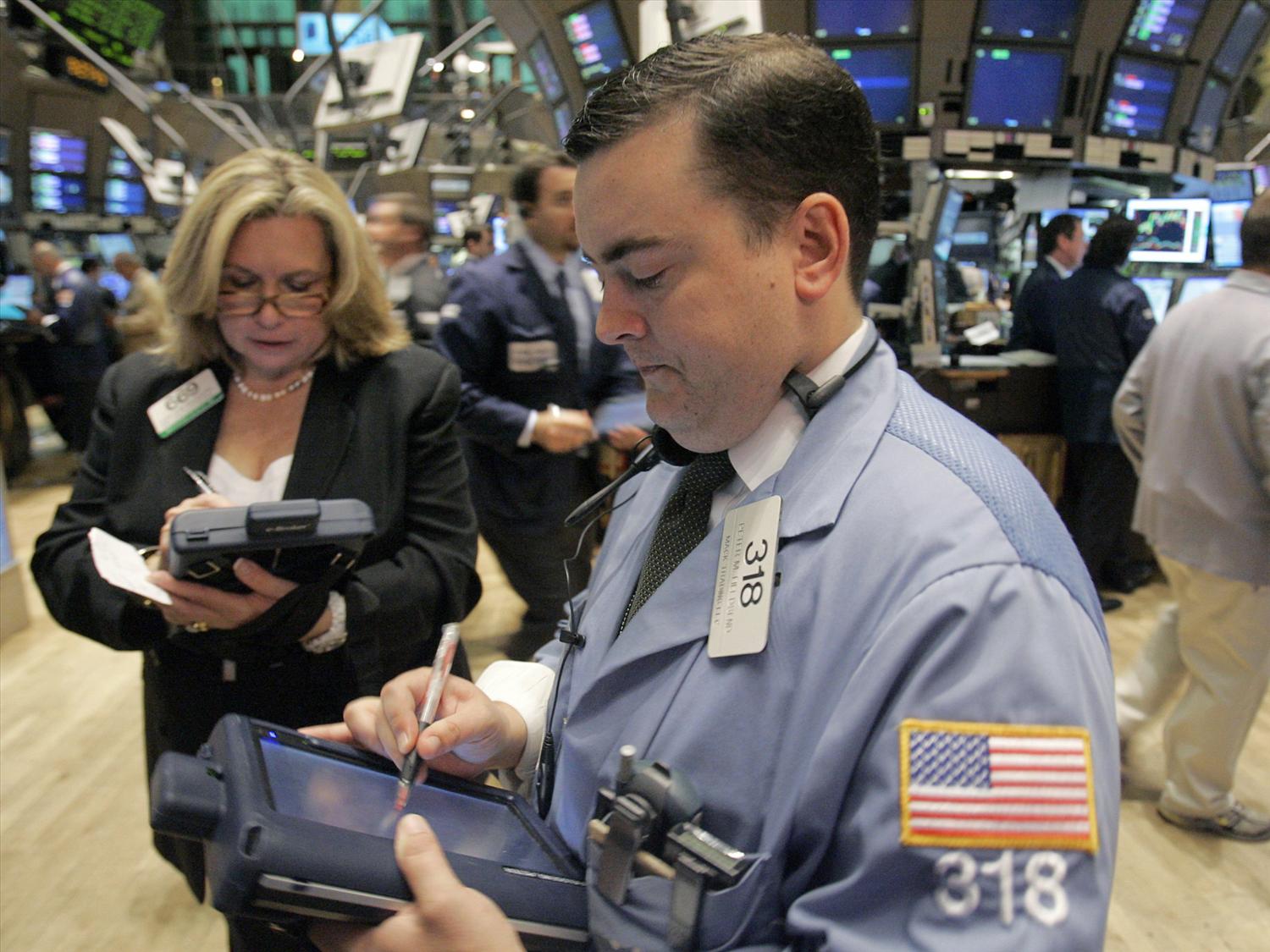 Dow rises for 13th straight day, stocks split after Fed decision: Stock market news today