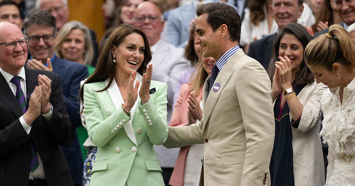 Princess Kate gives Wimbledon champion Roger Federer a lengthy standing  ovation at the All England Club