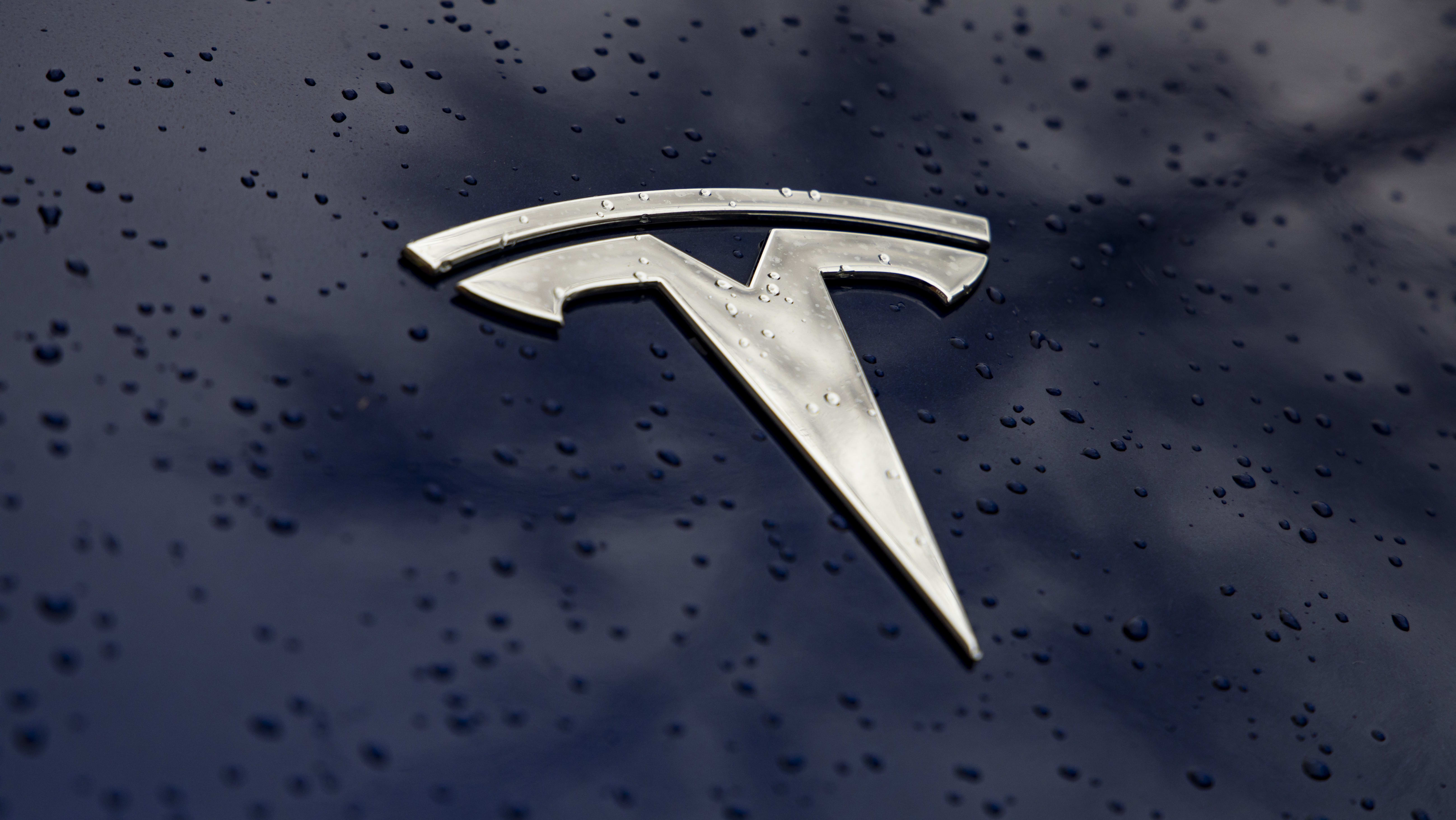 tesla logo wallpaper