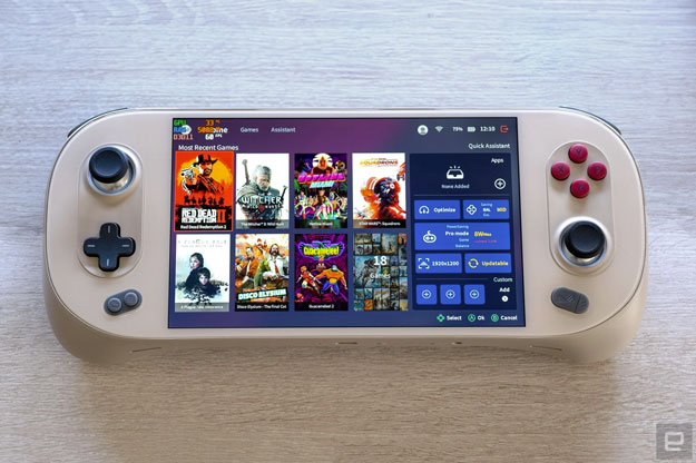 Image of the Ayaneo 2S PC gaming handheld on a grey wooden tabletop.