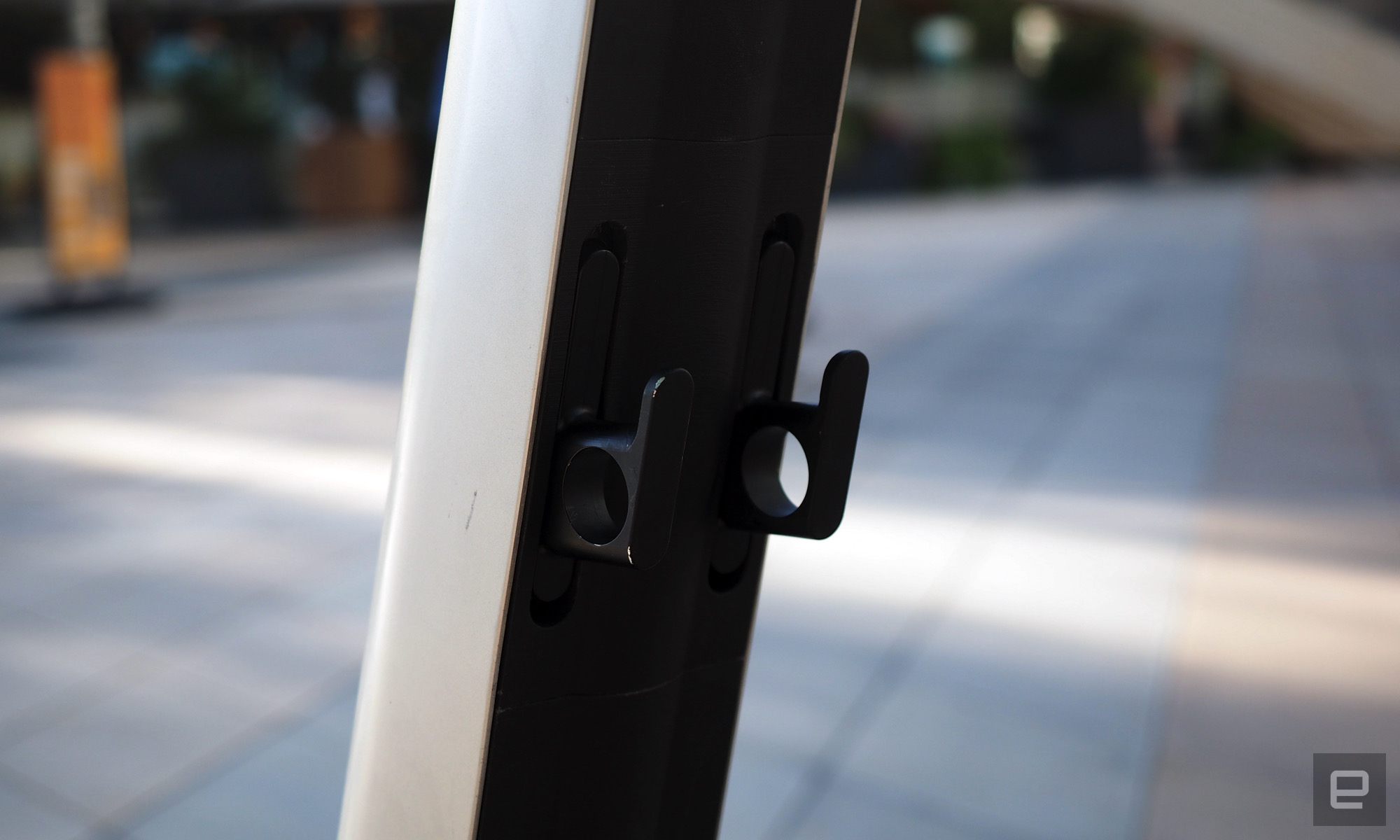 Image of the Bo M's load hook, a pair of fixtures that flip out from the chassis to hold a bag and also to act as a mounting point for a bike lock.