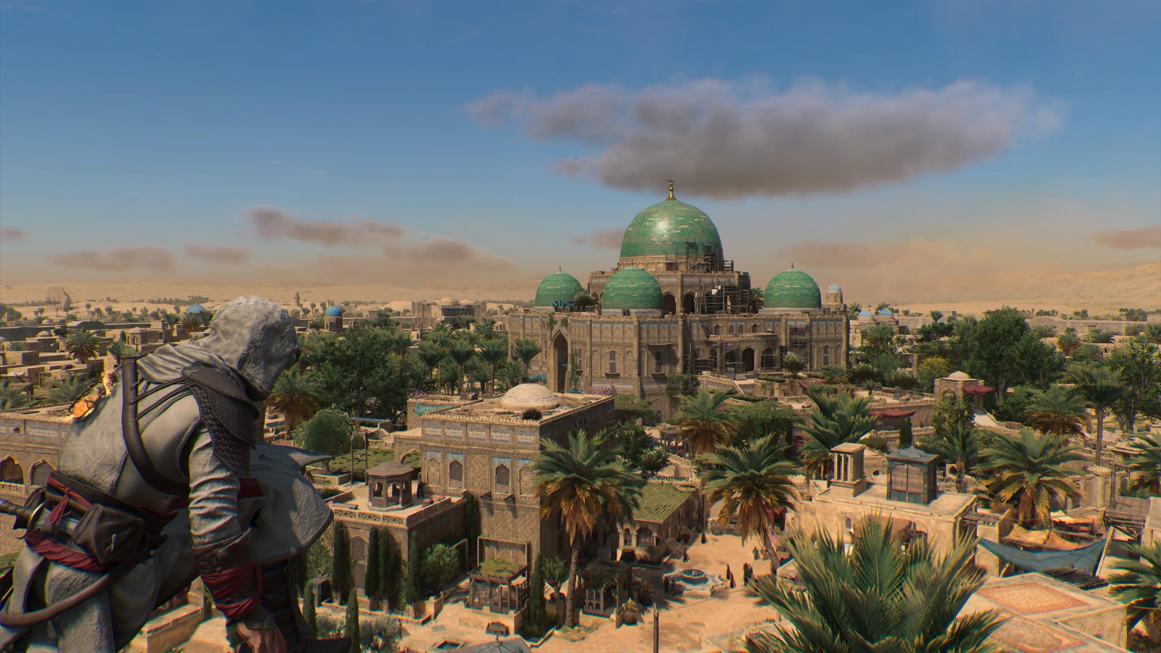 A hooded figure perched on a viewpoint looks toward a large green palace in a ninth-century version of Baghdad in Assassin's Creed Mirage.