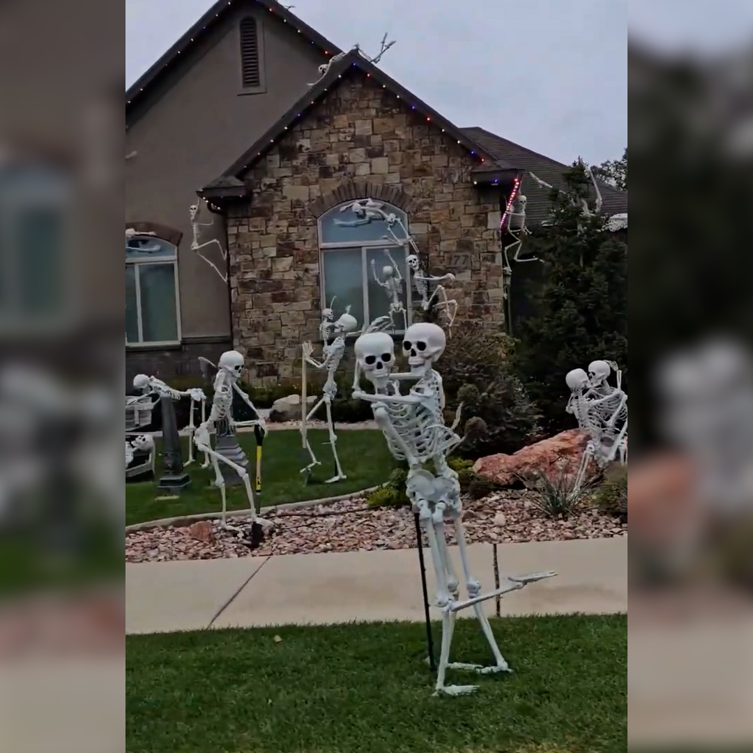 Dozens of skeletons take over this front lawn