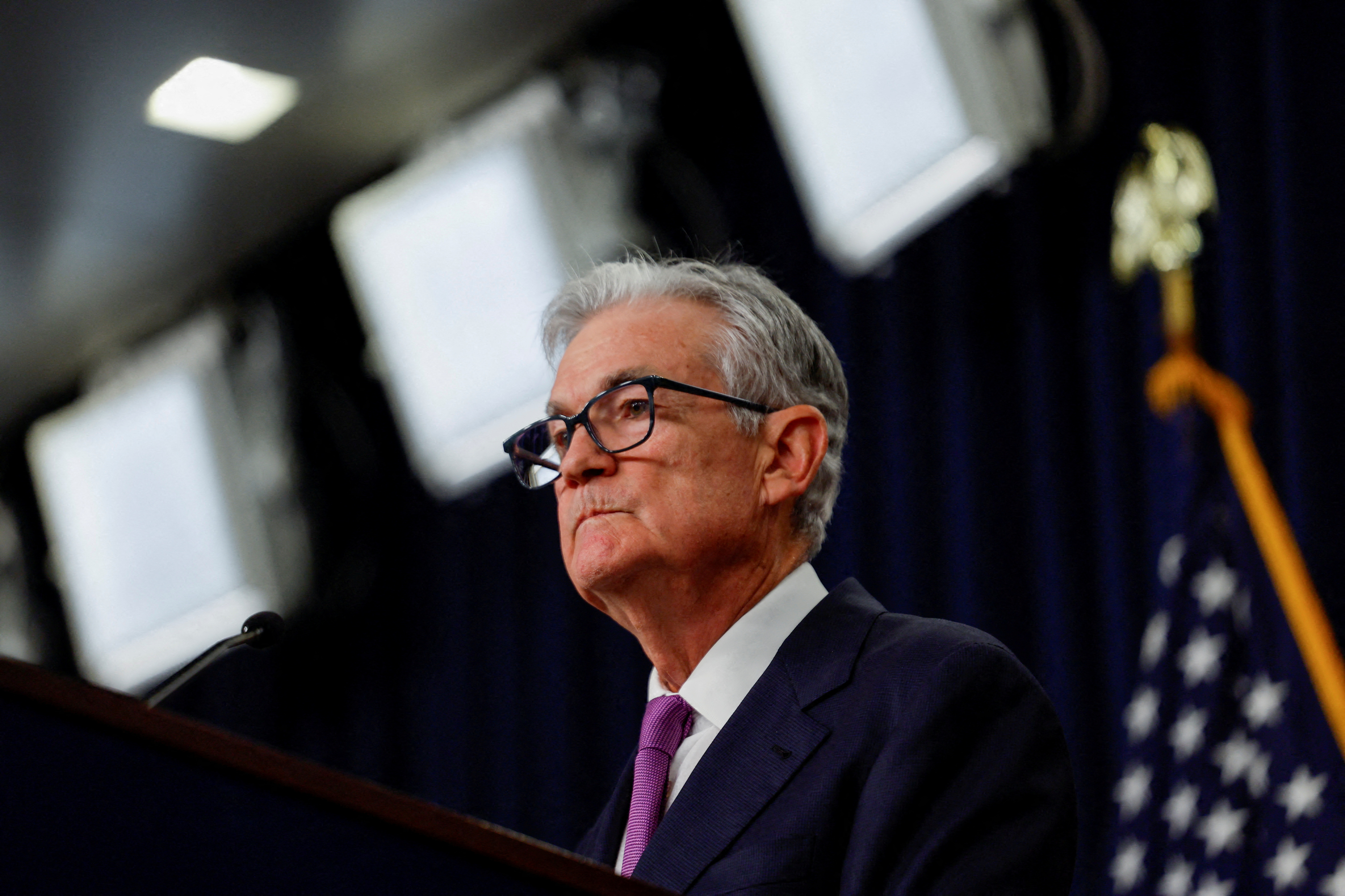 Powell says inflation still 'too high,' warns of more rate hikes if economy heats up