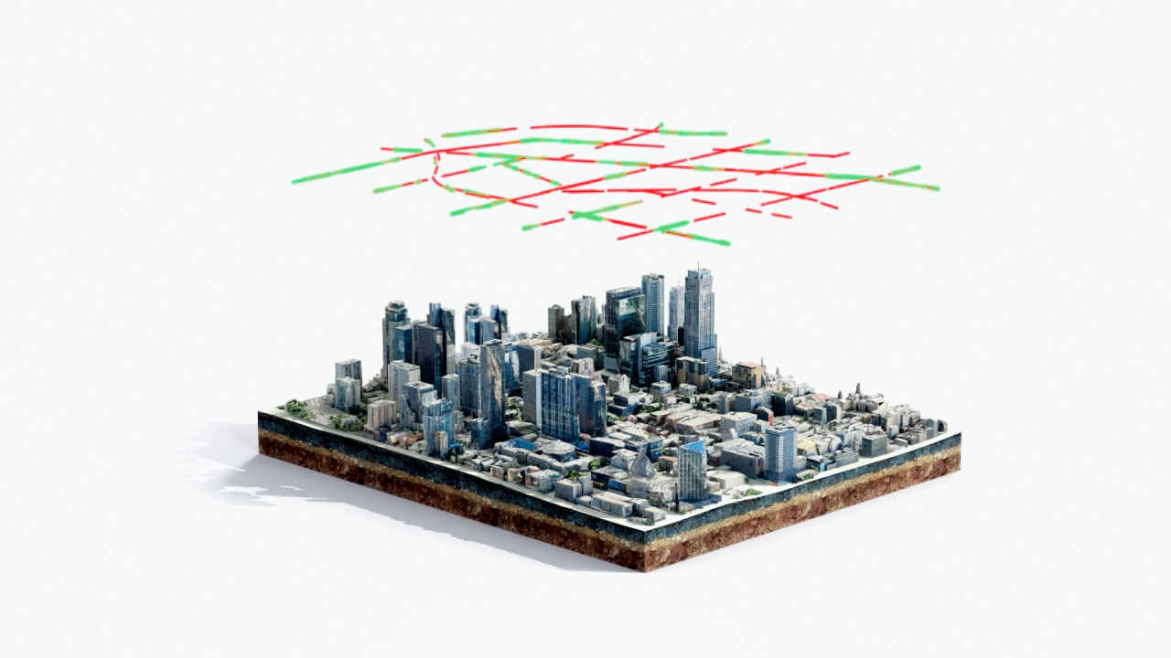 a chunk of city with traffic congestion lines overhead