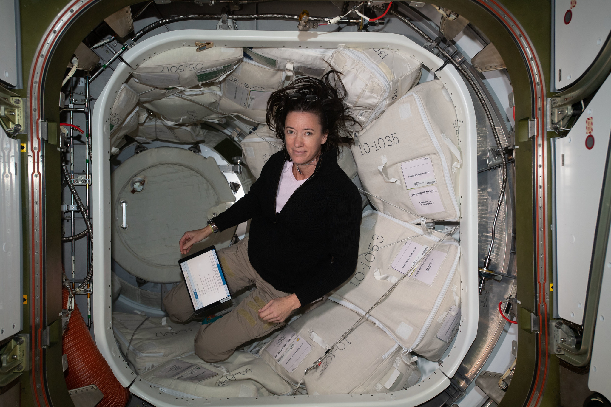 Expedition 65 astronaut Megan McArthur inside the Harmony module on the ISS in 2021