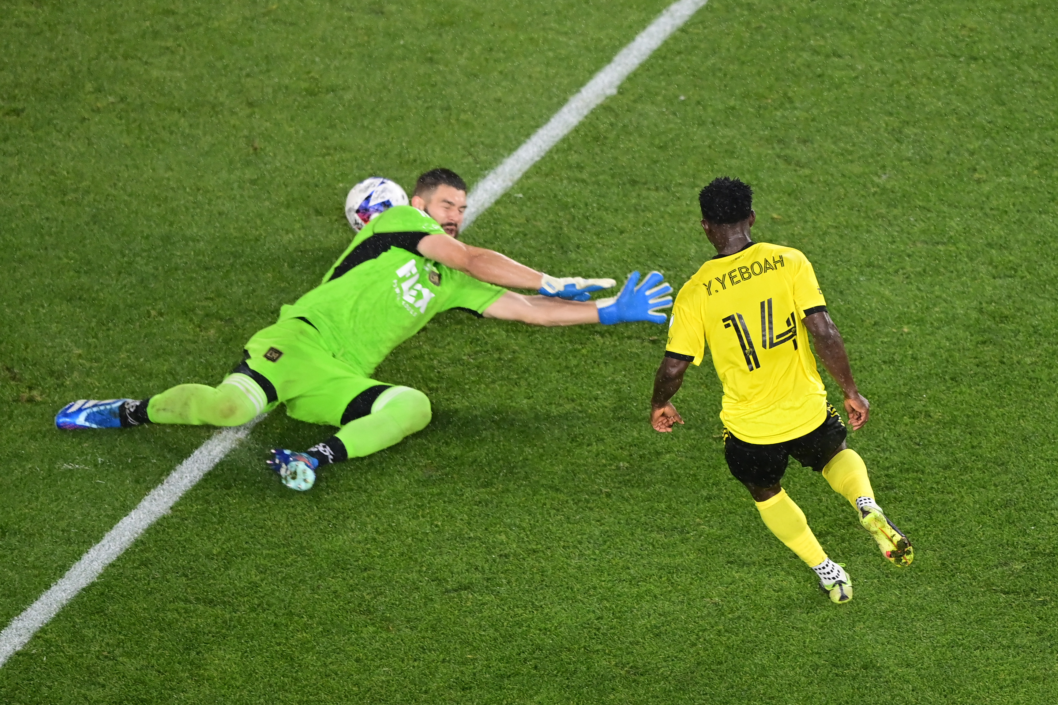 COLUMBUS, OHIO - DECEMBER 09: Yaw Yeboah #14 of Columbus Crew scores a goal against Maxime Crépeau #16 of Los Angeles FC during the first half during the 2023 MLS Cup at Lower.com Field on December 09, 2023 in Columbus, Ohio. (Photo by Emilee Chinn/Getty Images)