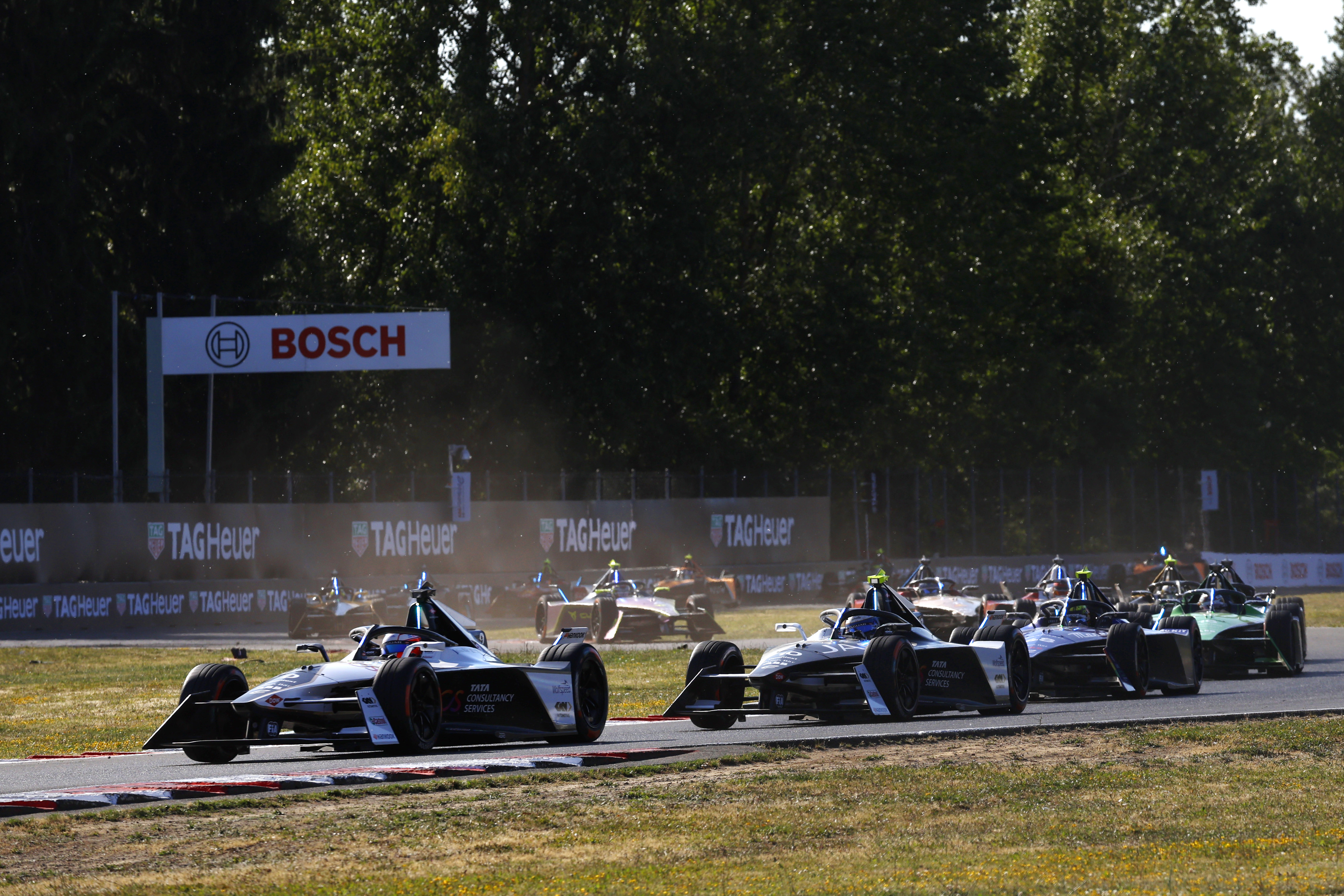 PORTLAND, OREGON - JUNE 24: In this handout provided by Jaguar Racing, Mitch Evans, Jaguar TCS Racing, Jaguar I-TYPE 6, leads Sam Bird, Jaguar TCS Racing, Jaguar I-TYPE 6, and Edoardo Mortara, Maserati MSG Racing, Maserati Tipo Folgore during the ABB FIA Formula E Championship - 2023 Southwire Portland E-Prix 12 on June 24, 2022 in Portland, Oregon. (Photo by Handout/Jaguar Racing via Getty Images)