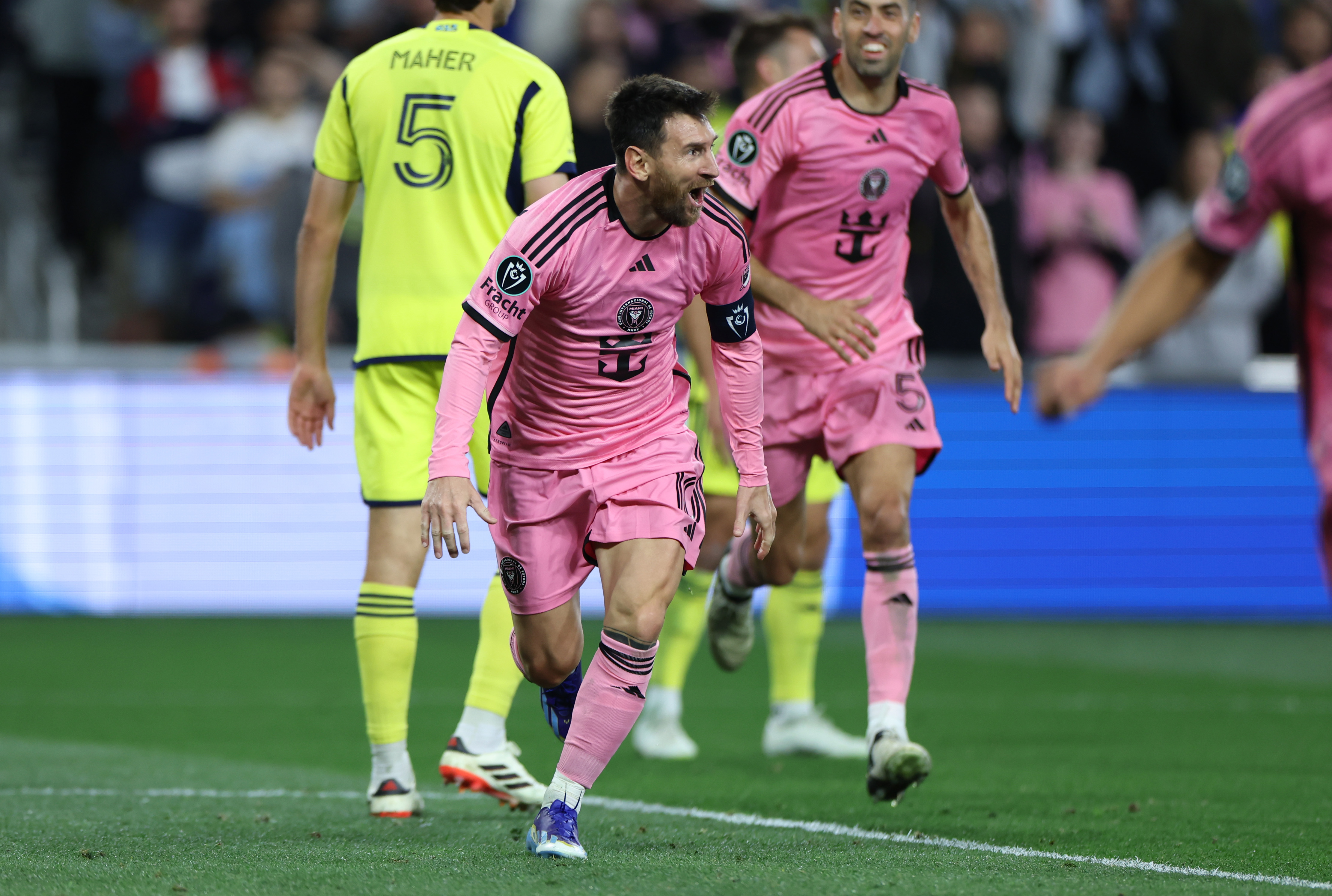 NASHVILLE, TENNESSEE - MARCH 07: Lionel Messi #10 of Inter Miami CF celebrates after a goal by Luis Suarez #9 against Nashville SC during the second half of the Concacaf Champions Cup Leg One Round of 16 match at GEODIS Park on March 07, 2024 in Nashville, Tennessee. (Photo by Donald Page/Getty Images)