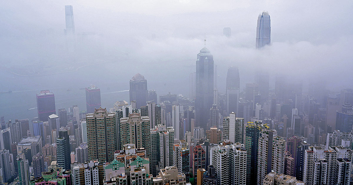 Hong Kong Real Estate Market Facing Challenges: Dividend Cuts and Debt Pressures Highlighted