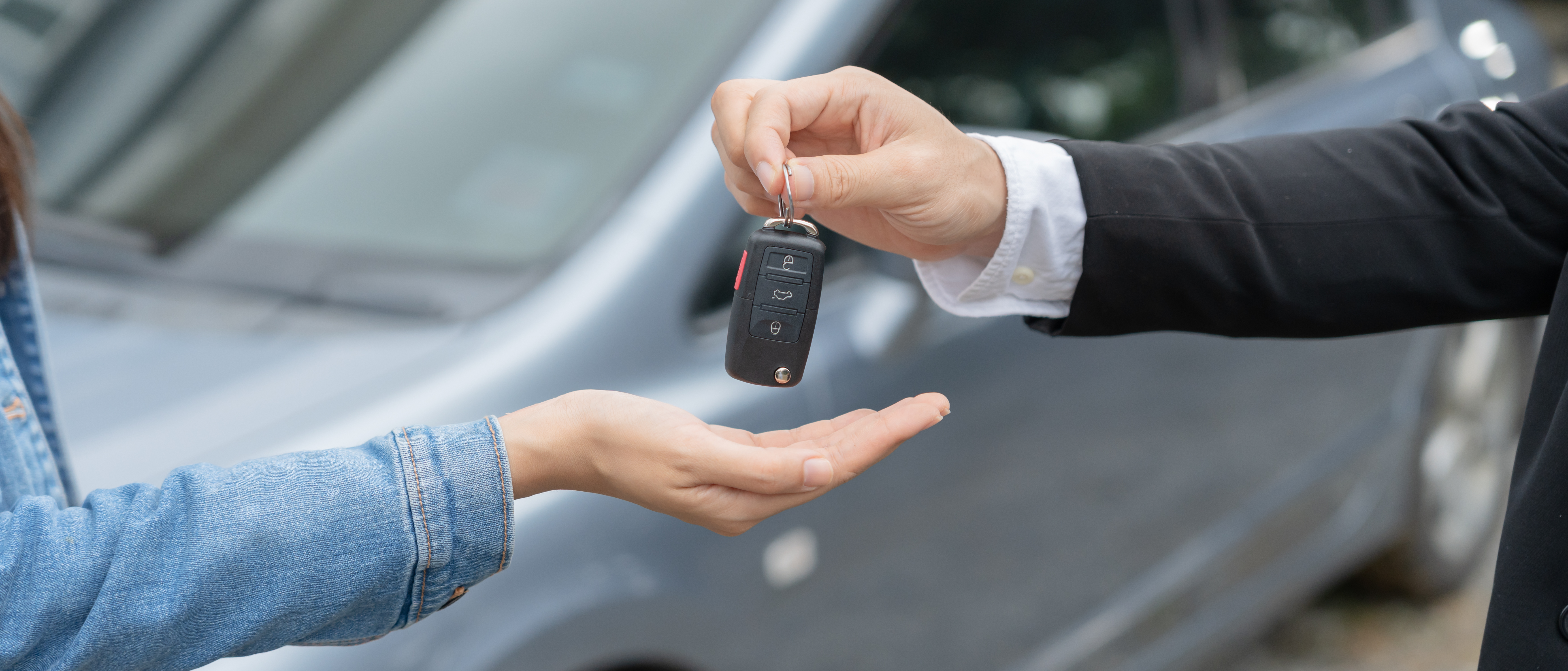 lease, rental car, sell, buy. Dealership manager send car keys to the new owner.  Sales, loan credit financial, rent vehicle, insurance,  renting, Seller, dealer, installment, car care business