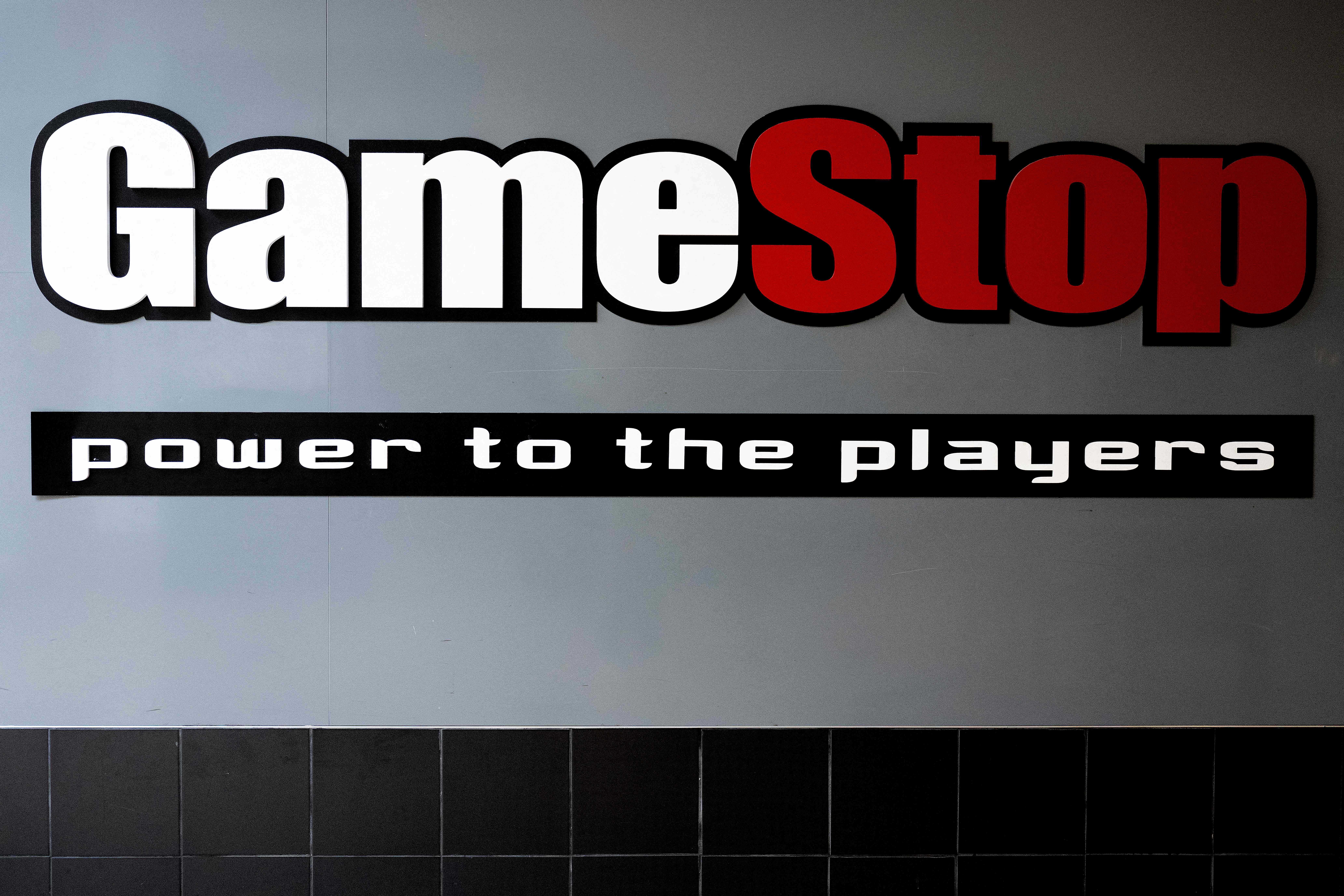 GameStop stock tanks on move to issue shares, quarterly sales decline