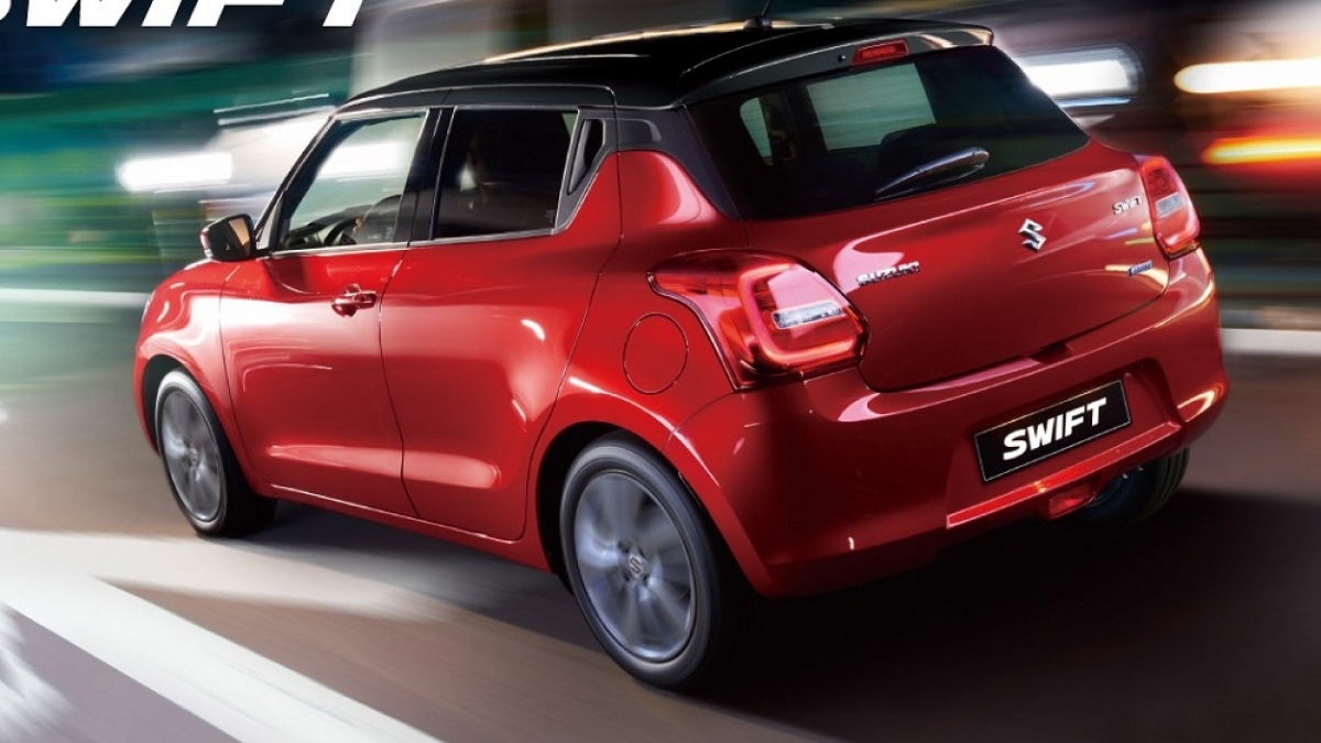 ▲2023 Suzuki Swift 1.2 GLX設計上導入「GO UNIQUE」品牌精神，以極富動感的車體輪廓，搭配全新格紋式鍍鉻六角型水箱護罩、黑色懸浮式車頂，車身彰顯出狂放不羈的好動性格。圖／Yahoo奇摩汽車機車