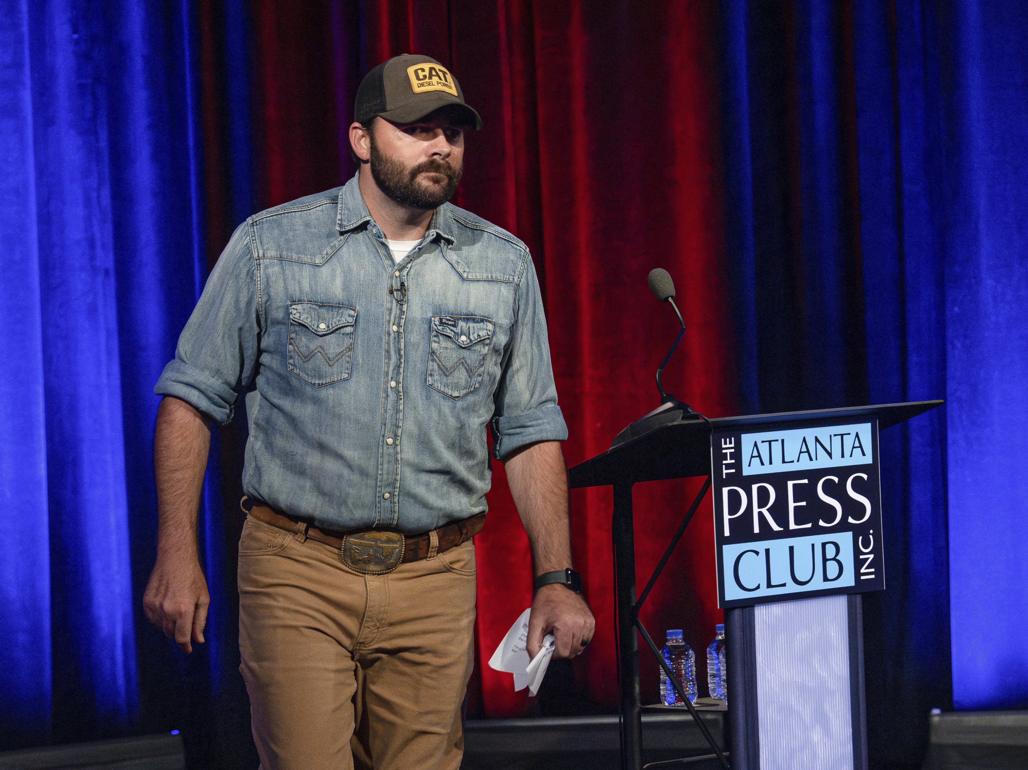 Georgia Republican convicted in Jan. 6 riot walks out during televised congressional primary debate