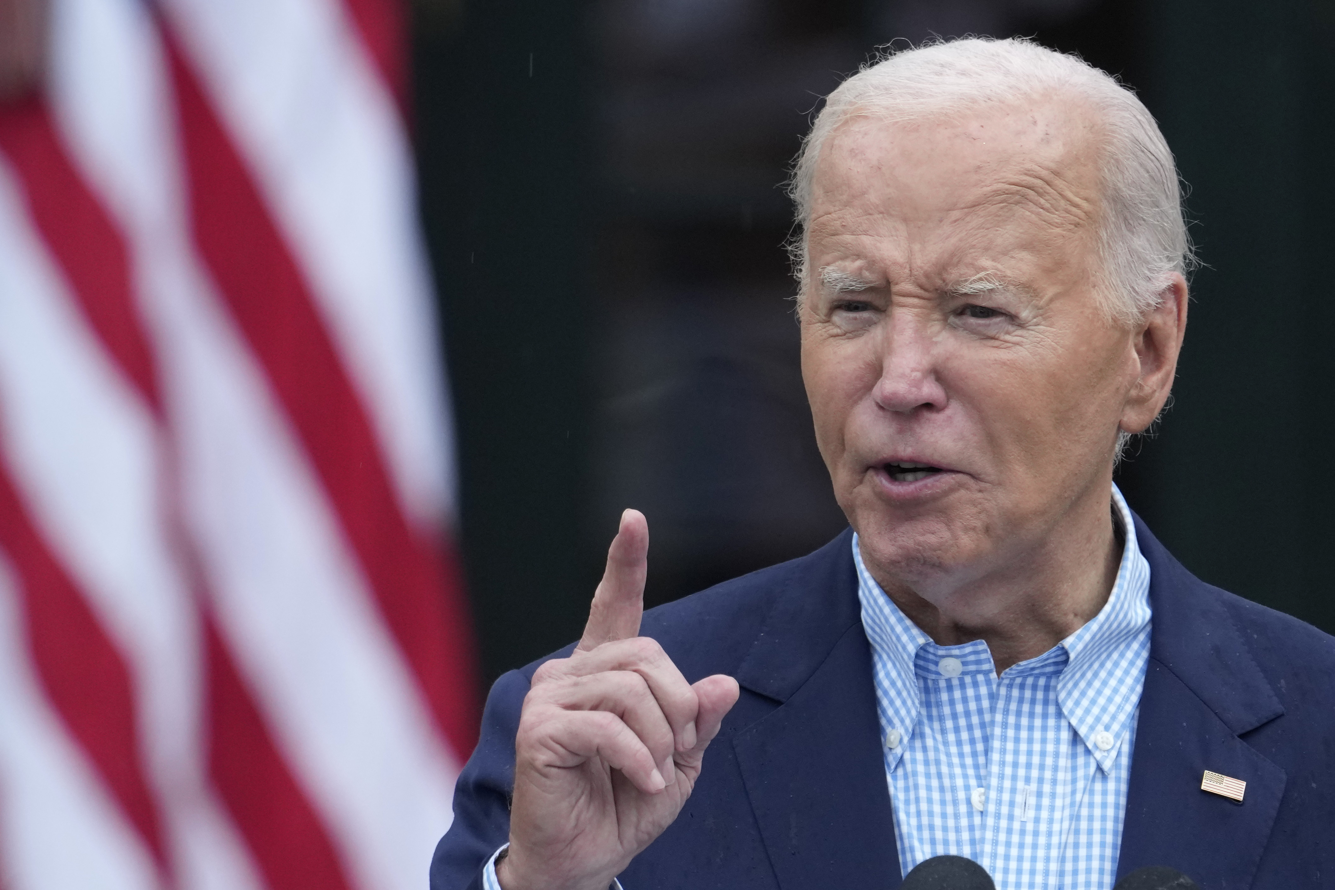 President Biden speaks to active-duty military service members and their families during a Fourth of July celebration at the White House on Thursday.