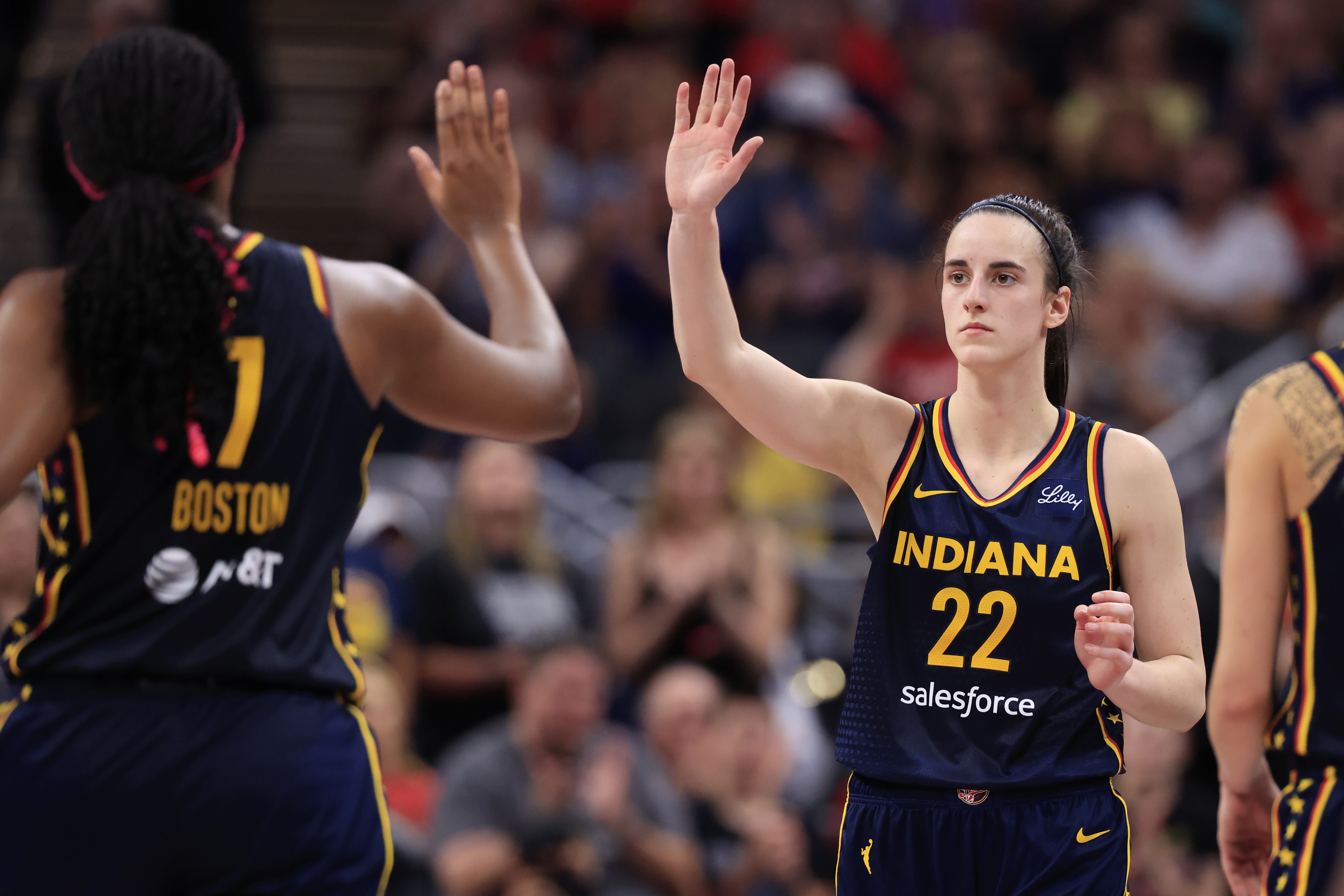 INDIANAPOLIS, INDIANA - SEPTEMBER 15: Caitlin Clark #22 of the Indiana Fever and Aliyah Boston #7 during the game against the Dallas Wings at Gainbridge Fieldhouse on September 15, 2024 in Indianapolis, Indiana. NOTE TO USER: User expressly acknowledges and agrees that, by downloading and or using this photograph, User is consenting to the terms and conditions of the Getty Images License Agreement. (Photo by Justin Casterline/Getty Images)