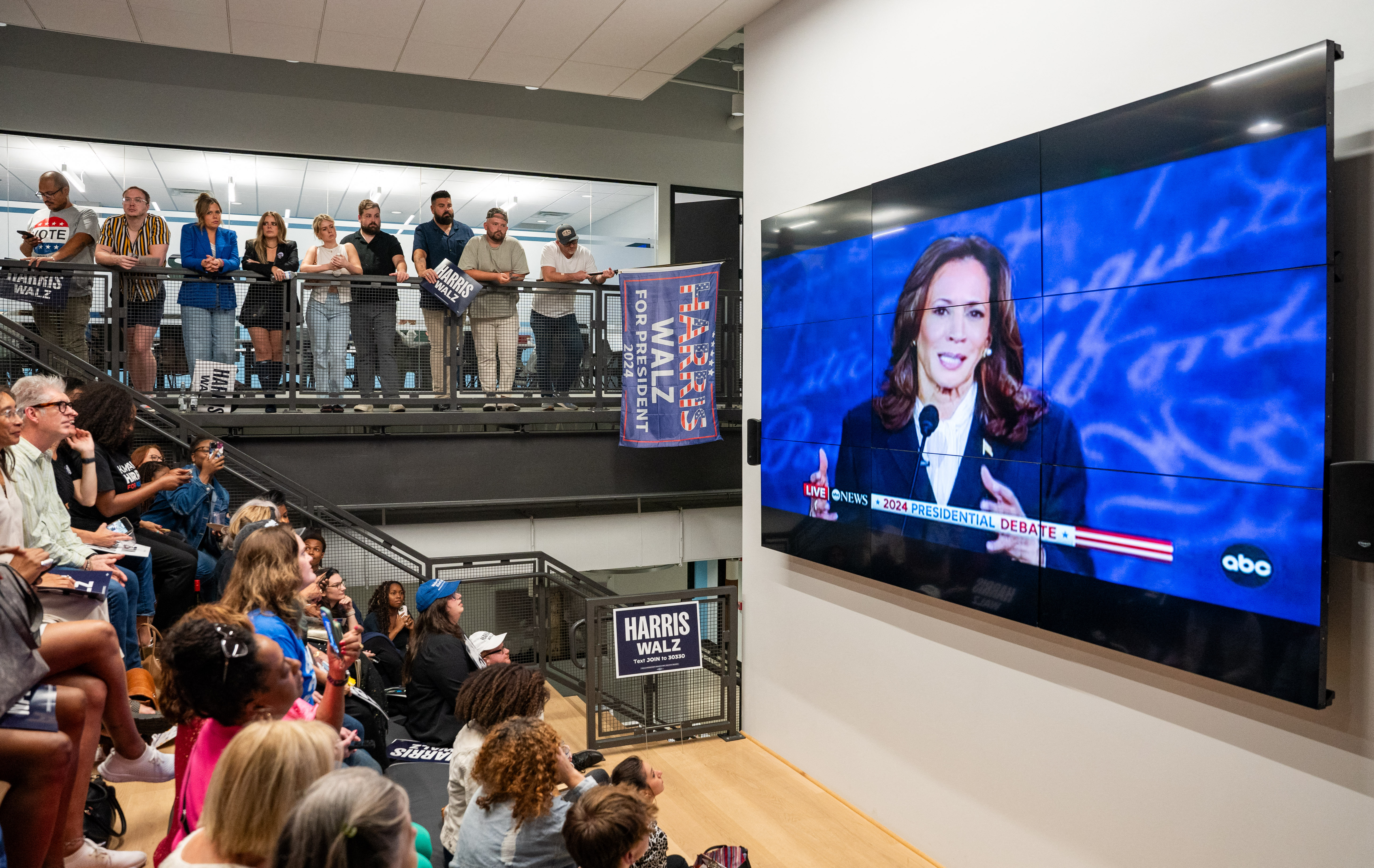 Supporters of Vice President and Democratic presidential candidate Kamala Harris attend a watch party during the US Presidential debate between Harris and former US President and Republican presidential candidate Donald Trump in in Nashville, Tennessee, on September 10, 2024. (Photo by SETH HERALD / AFP) (Photo by SETH HERALD/AFP via Getty Images)