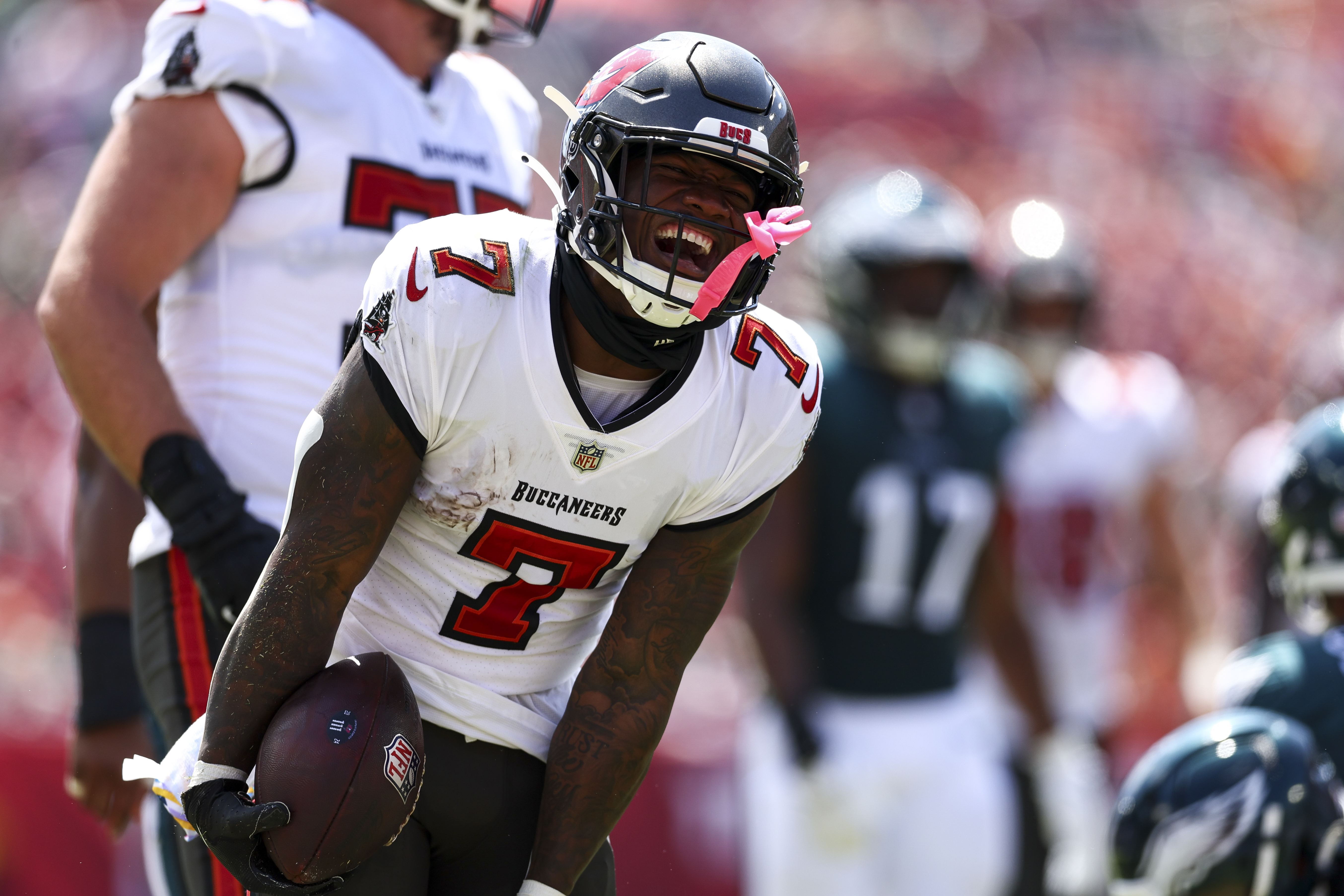 Bucky Irving #7 of the Tampa Bay Buccaneers celebrates after a play during the first quarter of an NFL football game against the Philadelphia Eagles at Raymond James Stadium on September 29, 2024 in Tampa, Florida. (Photo by Kevin Sabitus/Getty Images)