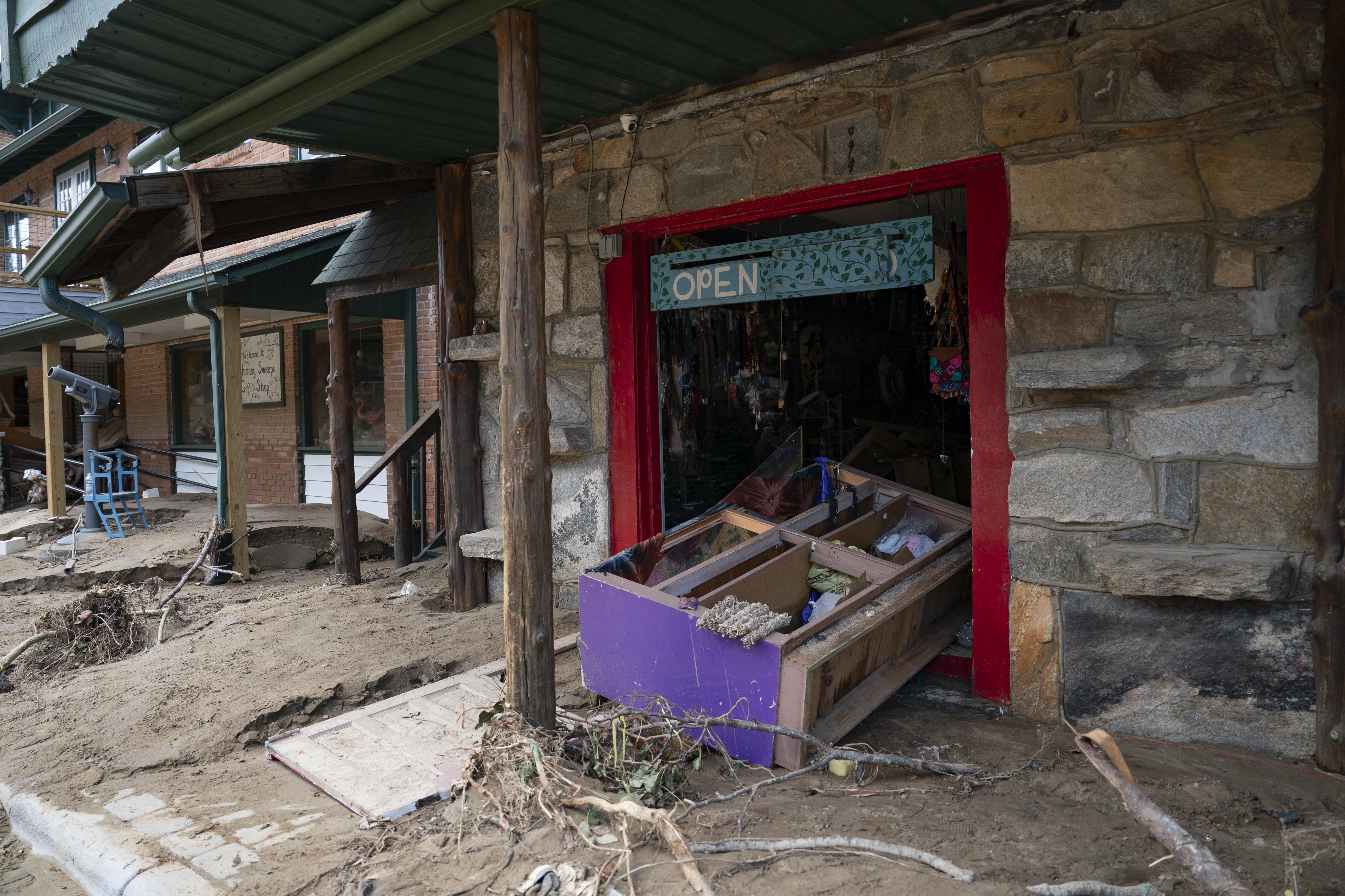 A damaged storefront is seen in downtown Chimney Rock, North Carolina, on the Wednesday after Hurricane Helene.