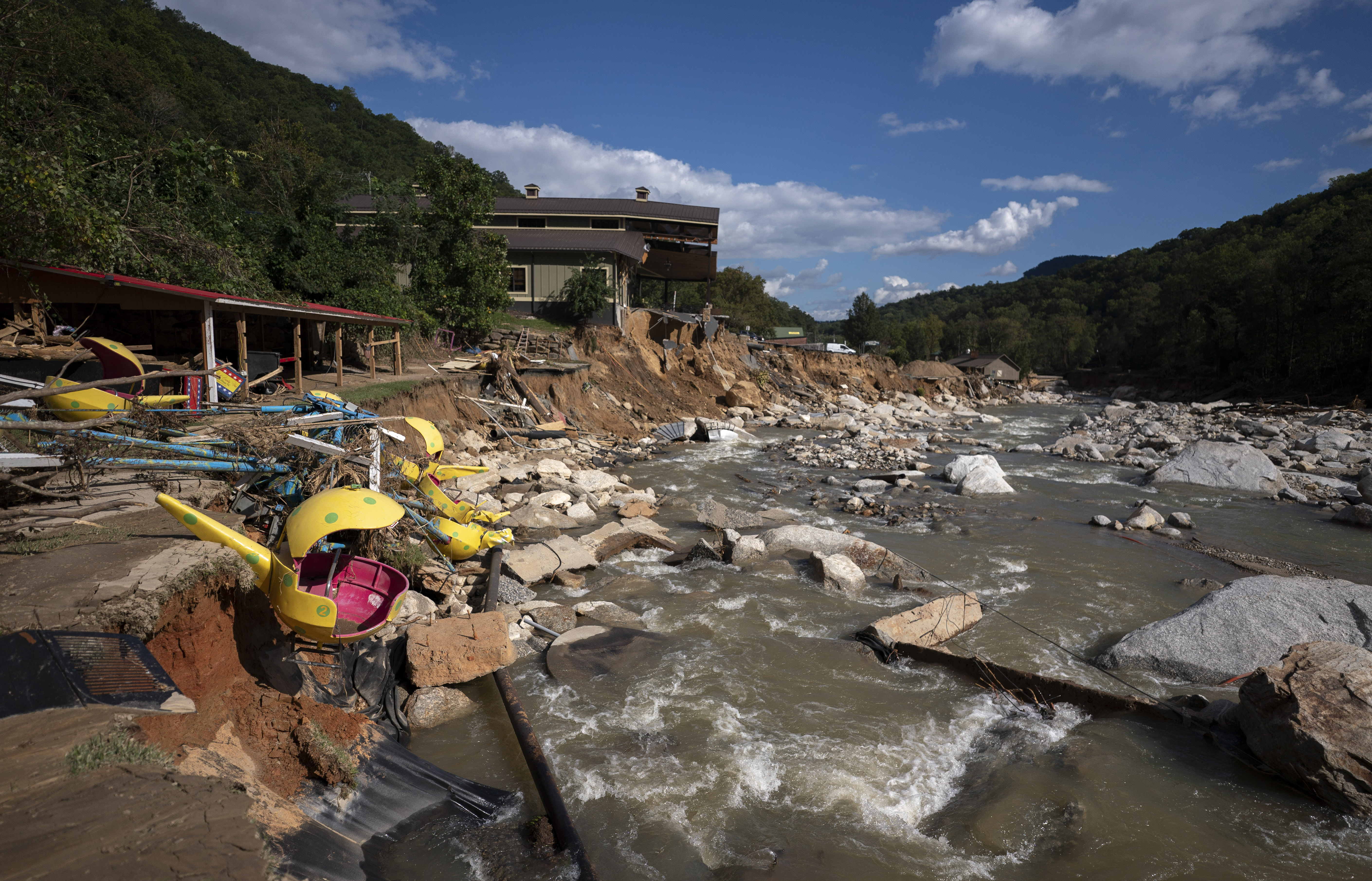 Flood damage was observed along Bayou Billy on the Broad River in Chimney Rock, NC on Wednesday following Hurricane Helene 