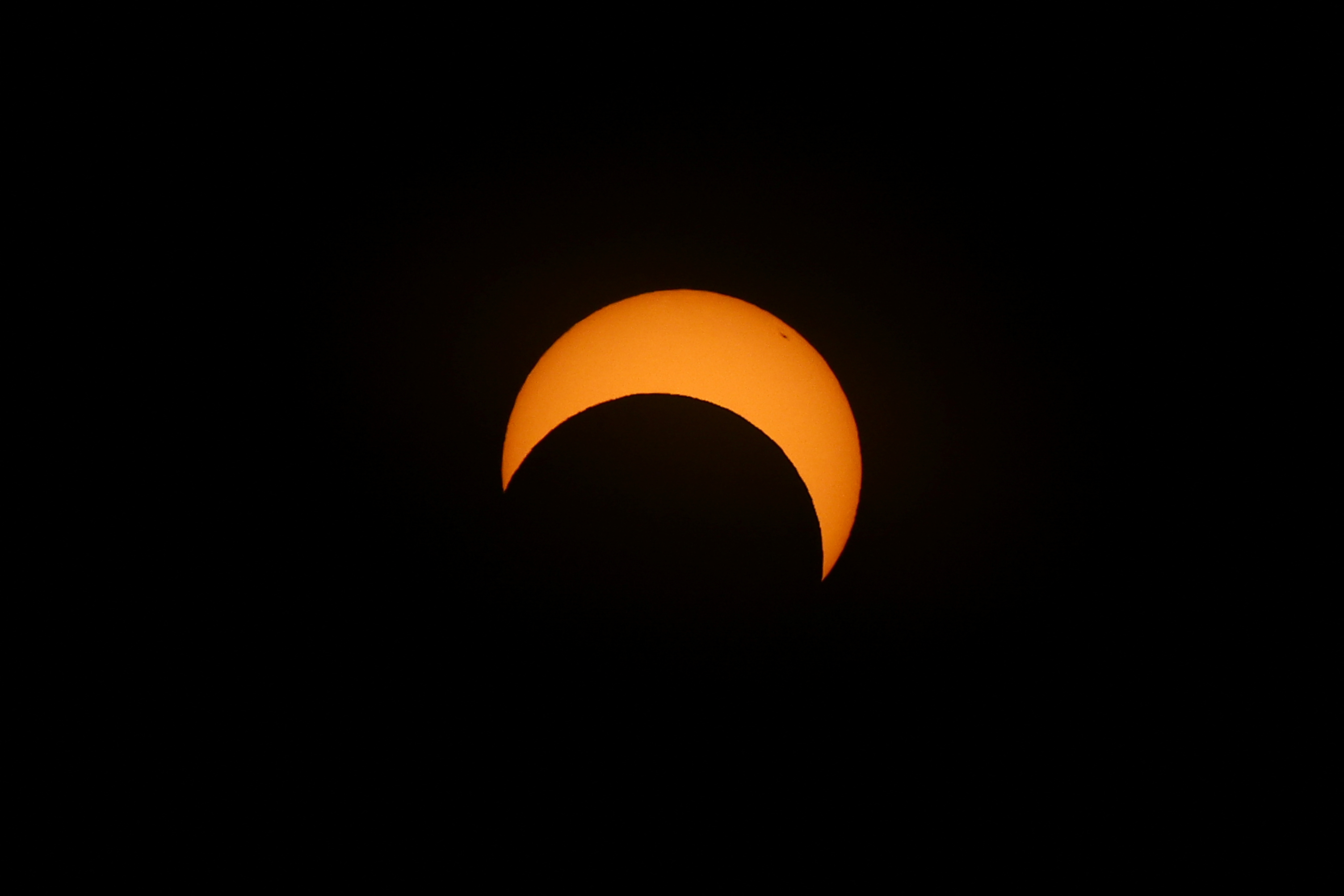 The moon passes the sun during an annular solar eclipse, in Las Horquetas, Santa Cruz, Argentina, October 2, 2024. REUTERS/Agustin Marcarian