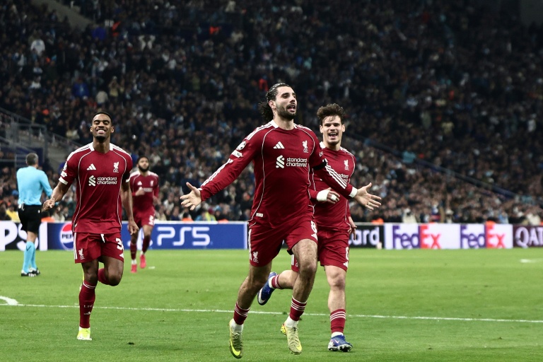 Liverpool see off Marseille to close on Champions League last 16