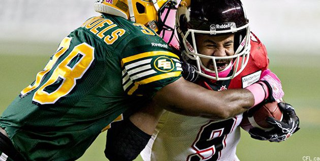 Stampeders down Eskimos 27-13, clinch home playoff game, improve hold on  first