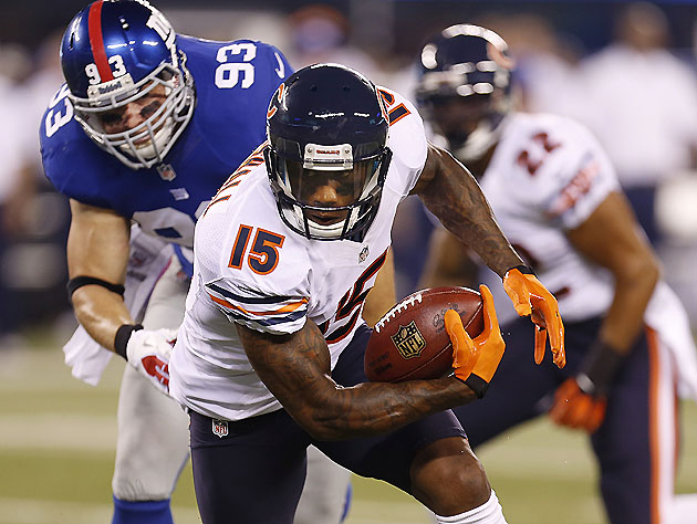 Chicago Bears wide receiver Devin Hester (23) carries the ball against the  Cleveland Browns in the