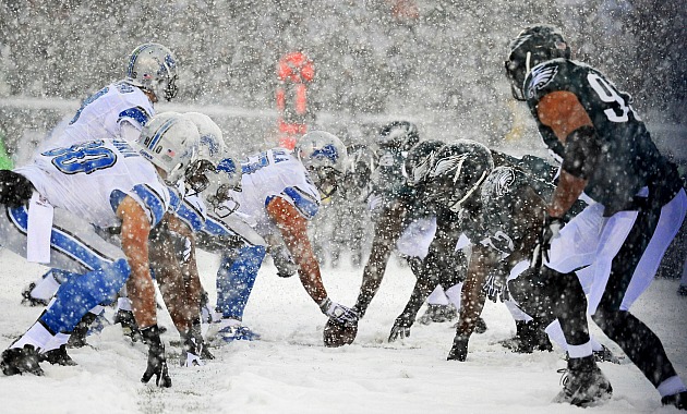 Buffalo Bills sign their name on the playoff bracket by snowing