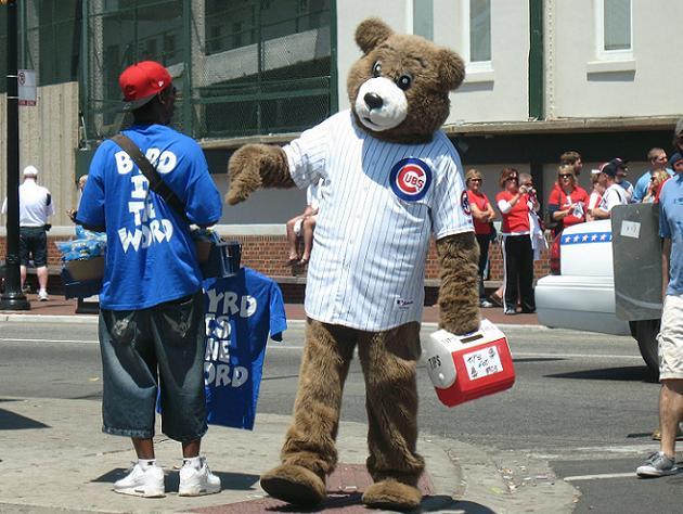 Clark, the Chicago Cubs mascot, wears a rainbow sleeve as he prepares to  catch ceremonial first pitches at Pride Night before a baseball game  between the Cubs and the Pittsburgh Pirates on