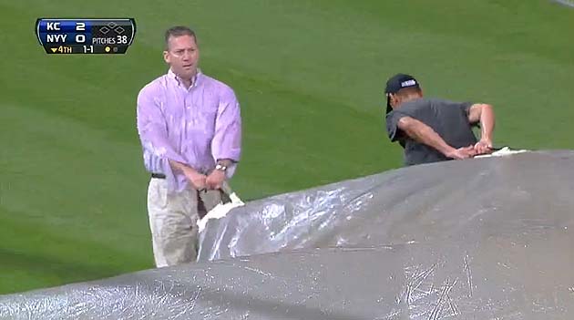 LOOK: KC grounds crew member gets rolled by tarp at ALDS