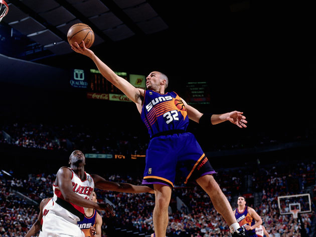 Guard Jason Kidd of the New Jersey Nets points down court during