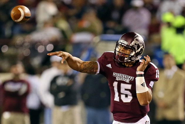 Dak Prescott Mississippi State Bulldogs Unsigned Maroon Jersey Touchdown Celebration During Liberty Bowl Photograph