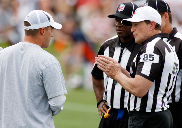 Referee Bill Leavy gets ready to look at a replay during NFL