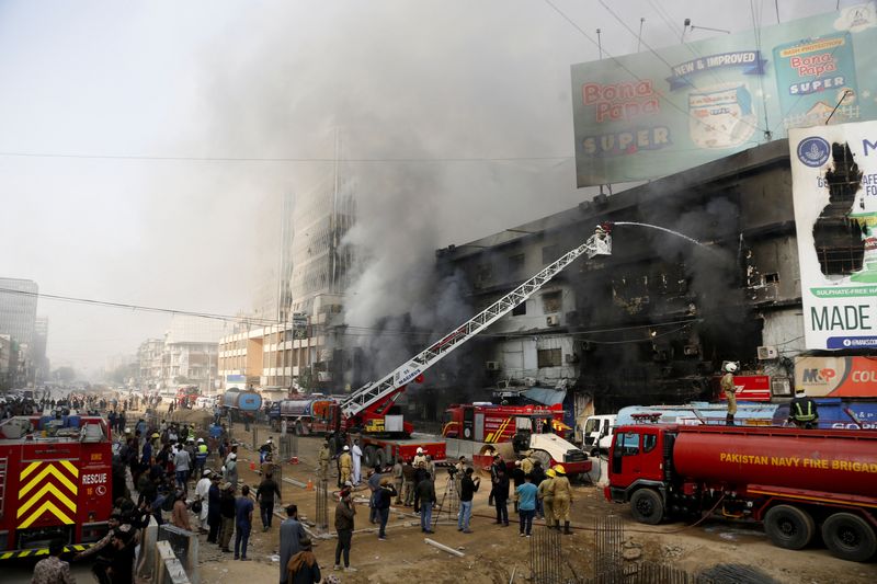 Dozens missing after massive Karachi mall fire, 19 killed