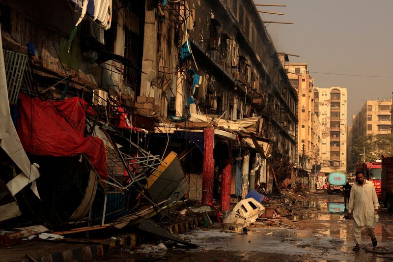 World Reuters Death toll in Karachi mall fire climbs to around 50, official says