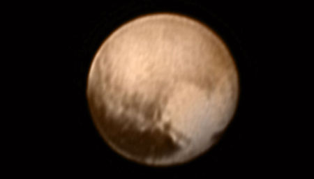 Pluto is pictured in this handout image from New Horizons? Long Range Reconnaissance Imager (LORRI)