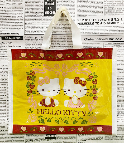 【震撼精品百貨】Hello Kitty 凱蒂貓~日本SANRIO三麗鷗KITTY塑膠袋/購物袋-古典咖*03778