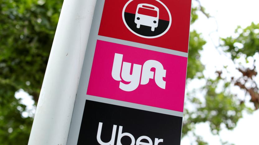 A sign marks a rendezvous location for Lyft and Uber users at San Diego State University in San Diego, California, U.S., May 13, 2020.      REUTERS/Mike Blake