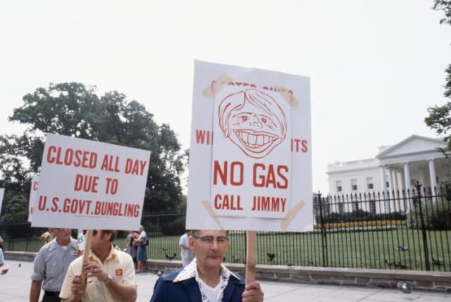 When the Arab oil boycott caused serious shortages of fuel in the United States, many citizens protested. There were long lines at gas stations and people could buy gas on only certain days of the week. In this case, people carry signs condemning Pres. Carter and his administration's handling of the energy crisis. (Photo: Wally McNamee/CORBIS/Corbis via Getty Images)