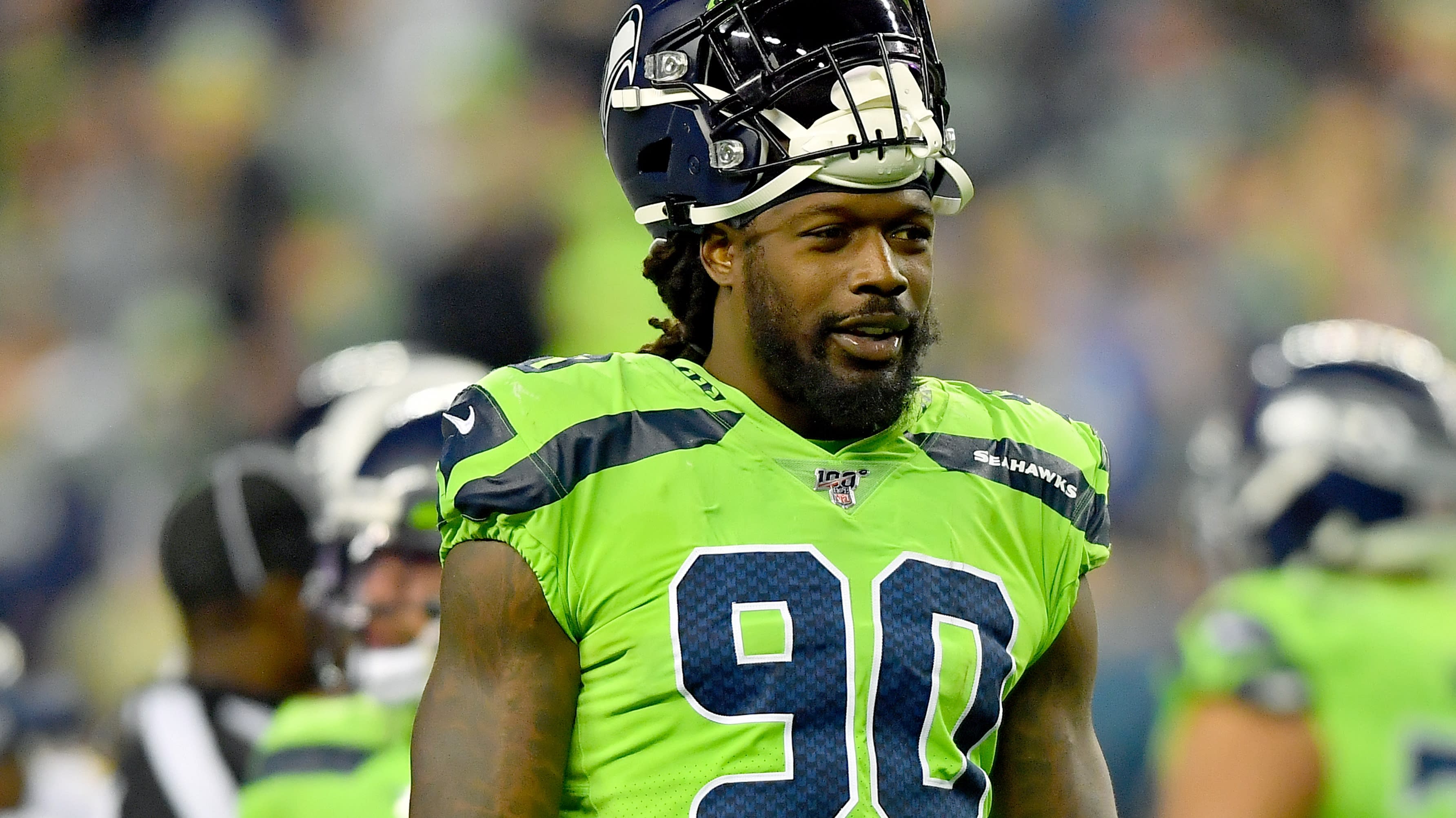 Tennessee Titans linebacker Jadeveon Clowney (99) plays against