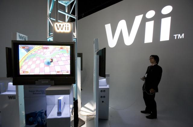 Nintendo introduces its new Wii game console at a press conference in New York City on September 14, 2006. The console, will retail at a suggested price of US $250.00 and will come with a wireless (wifi) controller. The Wii will compete with Sony's Playstation and Microsoft's XBOX video games.  (Photo by James Leynse/Corbis via Getty Images)